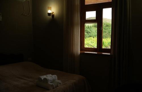 T'ba Hotel | Relax at Rati's Oda: Oceanfront Pool & Family-Friendly Stay