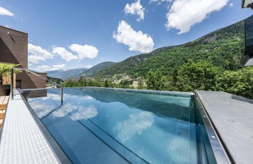 Marilleva 900 Hotel | Discover Ravelli Sporting: Oceanfront Escape with Spa
