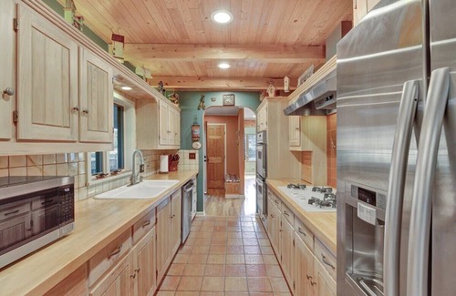 Cascade-Chipita Park Cabin | Enchanted Raven's Nest: Pet Friendly with Hot Tub & Spa