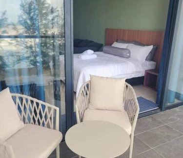 Sematan Apartment | Roxy Beach Apartment: Guest Rated 9.5, Oceanfront Relaxation
