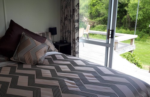 Te Rangiita House | Relax at Re-Cooper-ation: Swim, Fish & Recharge Today!