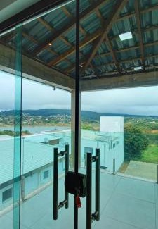 Capitolio House | Elegant Recanto Brenda: Scenic Lake Views and Pool Access