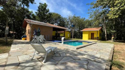 Pirenopolis House | Discover Recanto Luz: Oceanfront Retreat with Pool Access