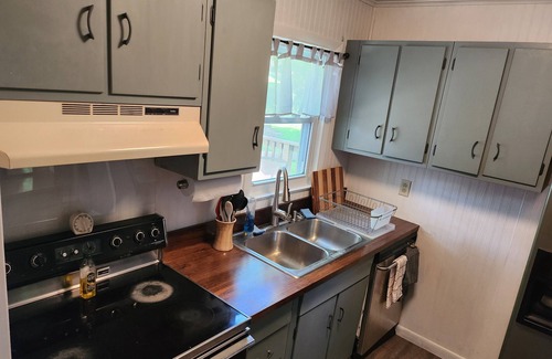 The Village of West Clay House | Recently remodeled 3 bed, 1.5 bath home on a beautiful lot w 3 ponds & creek
