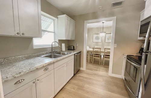 Lakeside Point House | Updated 2/2 Home with Hot Tub, Steps from the Beach