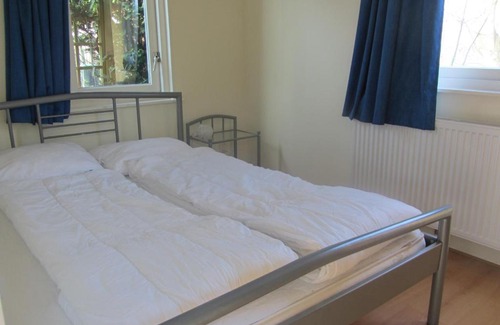 Warmenhuizen Resort | Idyllic Bungalow Steps from the Beach with Ocean Views