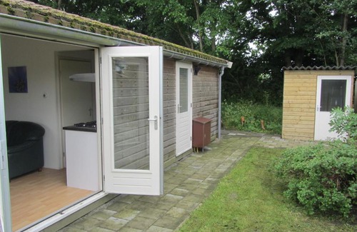 Warmenhuizen Resort | Idyllic Bungalow Steps from the Beach with Ocean Views