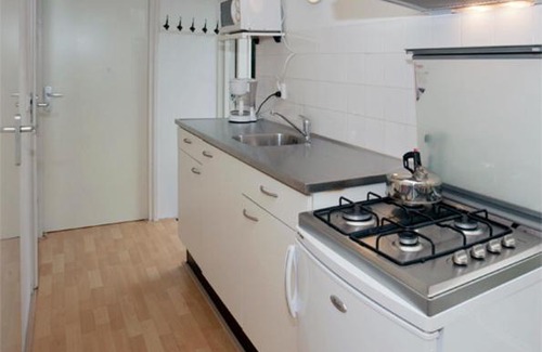 Warmenhuizen Resort | Idyllic Bungalow Steps from the Beach with Ocean Views