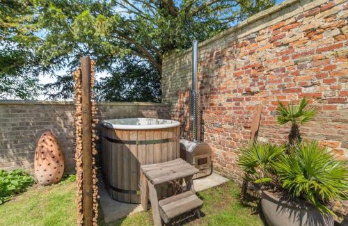 Oxborough House | Relax at Rectory Lodge in Norfolk with Pool & Hot Tub
