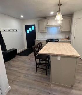 Blackfoot House | Family-Friendly Red Brick Retreat with Guest Rated 9.8