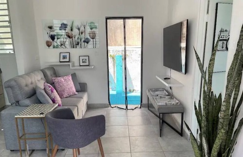 Sagrado Corazon Apartment | Red Door Lovely 1 Bedroom unit with small patio