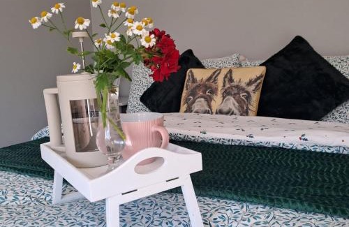 Buncrana House | Discover Red Gate Cottage: Family-Friendly Retreat Awaits