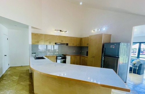 Rarotonga House | Indulge in Comfort at Red Hibiscus Home with Hot Tub