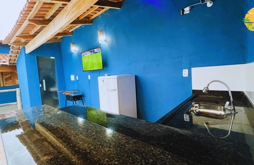Corumbau House | Relax at Red Macaw: Pet-Friendly Oasis with Pool & Beach Access