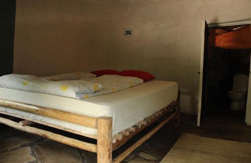 Nyakinama House | Inviting Red Rocks Rwanda - Child-Friendly Campsite Retreat