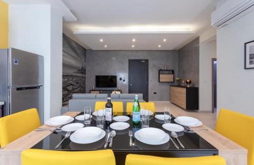 Marsalforn Apartment | Enchanting Red Rose: Oceanfront Haven with Top Ratings