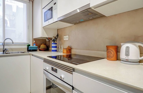 Sitges Town Center Apartment | Experience Red Velvet Apartment: Ideal for Families & Relaxation