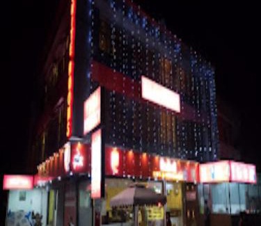 Manjeri Hotel | Budget-Friendly Stay at Redbell Suites Manjeri with Breakfast