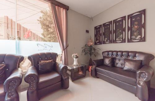 North Cirebon Hotel | Family-Friendly RedDoorz at La Mega with Ocean Views