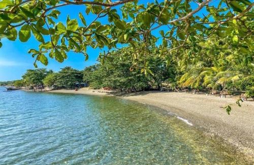 Asturias Resort | Oceanfront Escape at RedDoorz St Anthony Beach Resort