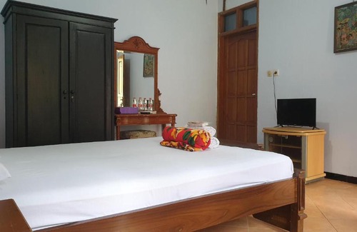 Kotaraja Hotel | Budget-Friendly Stay at RedDoorz @ Cigombong for Families