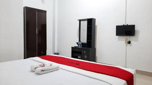 Kotaraja Hotel | Discover RedDoorz @ Gerson Hotel Abepura - Family Friendly Stay