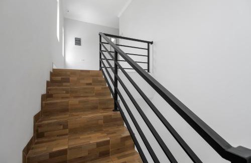 Tomang House | Convenient RedDoorz Near Central Park Mall for Families