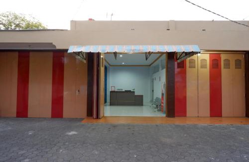 Purwokerto House | Budget-Friendly RedDoorz: Child-Friendly Stay Near GOR Satria