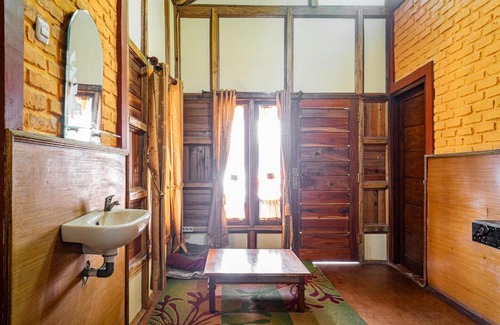 Rancabali House | Cozy RedDoorz Retreat Near Kawah Putih Ciwidey