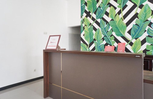 Dinoyo House | Accessible Comfort at RedDoorz Plus Tlogomas - 8/10 Rated