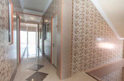 Sedati House | Family-Friendly Getaway at RedDoorz Syariah At Sedati
