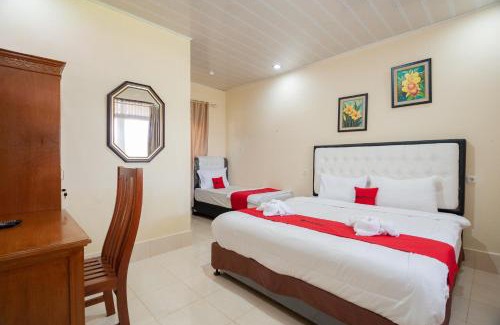 Agam Hotel | Discover Reddoorz Syariah Near Tirtasari Sonsang