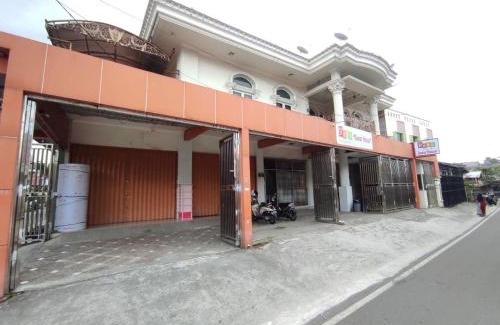 Bukittinggi Hotel | Family-Friendly RedDoorz Syariah Near Pasar Aur Kuning