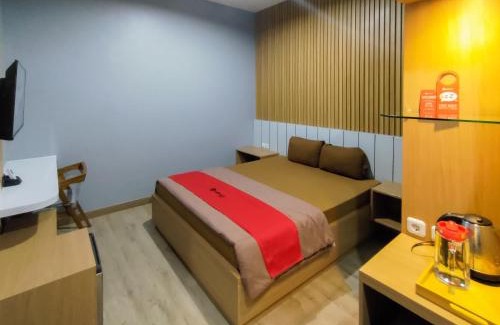 Jambi House | Guest Rated RedDoorz Syariah Near Tugu Juang Jambi