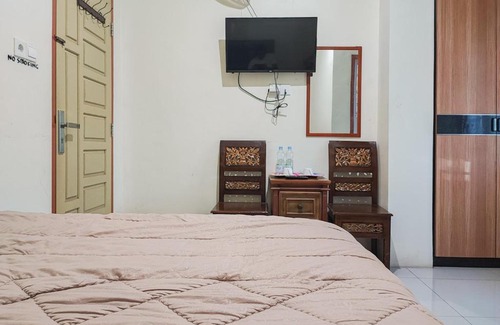 Sungai Penuh Hotel | Family-Friendly RedDoorz Syariah @ Penginapan Citra Alam 2