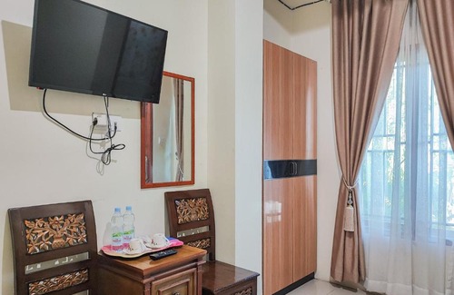 Sungai Penuh Hotel | Family-Friendly RedDoorz Syariah @ Penginapan Citra Alam 2
