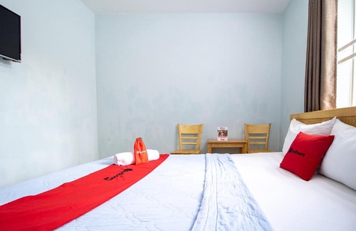 District 9 Hotel | Affordable Family-Friendly Stay at RedDoorz Thien An Hotel