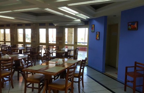 Novo Paraiso Hotel | Budget-Friendly MK Express Hotel with Pool & Accessibility