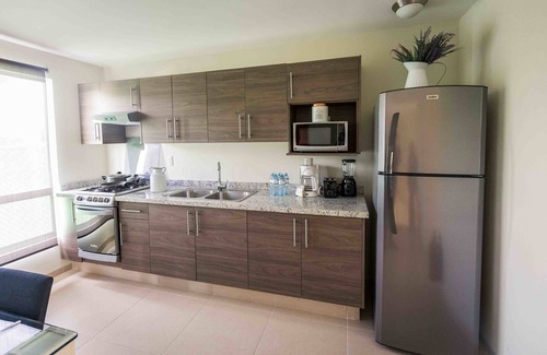 San Luis Potosi Villa | Comfortable Redwood Villas: Extended Stay with Pool & Spa