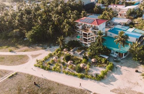Thulusdhoo Island House | Oceanfront Retreat at Reef Edge Thulusdhoo, Maldives