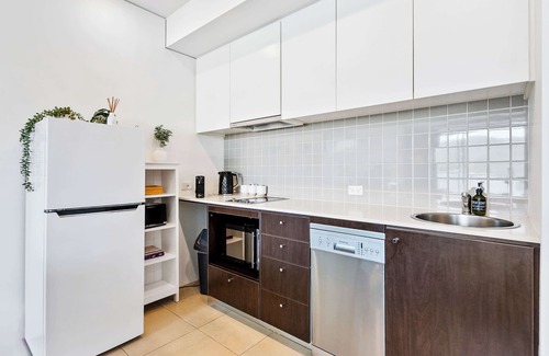 Cairns Central Business District Apartment | Reef: Waterfront Retreat with Pool, Sauna & Ocean Views