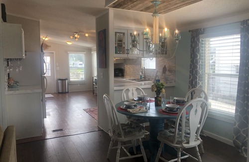 Indian Harbor Estates House | Reel Paradise Cottage: Ideal Canal Front with Dock Access
