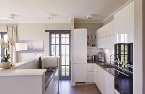 Kreptitz House | Elegant Reetland am Meer - 4-Star Villa with Sauna & Pool