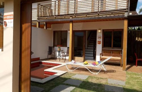 Jabaquara House | Rubi Hotel: Modern Suites with Ocean View & Pool Access