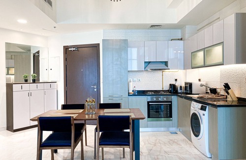 Business Bay Apartment | Elegant 1BDR Retreat with Pool & Breakfast in Business Bay