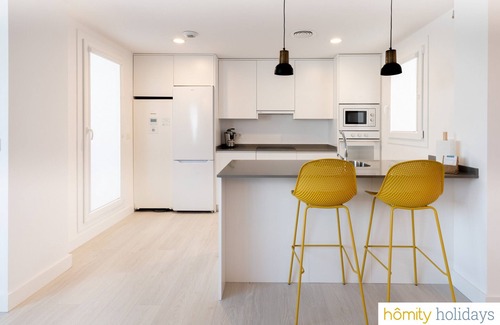 Motril Apartment | Discover Homity Penthouse: Relax by the Pool & Spa