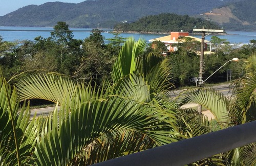 Lagoinha Apartment | Relax at Kendy Flats: Rooftop Pool & Ocean Views Await