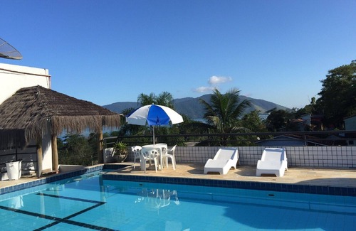 Lagoinha Apartment | Unwind at Kendy Flats: Rooftop Pool & Ocean Views