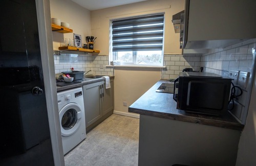 Airdrie Apartment | Refreshing Modern Apartment in Airdrie
