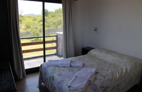 Capilla del Monte Hotel | Relax at Refugio Uritorco with Spa and Hot Tub Amenities